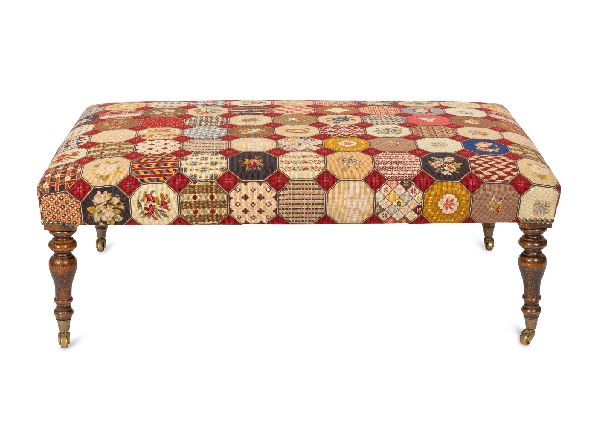 A Mahogany Needlepoint Upholstered Ottoman