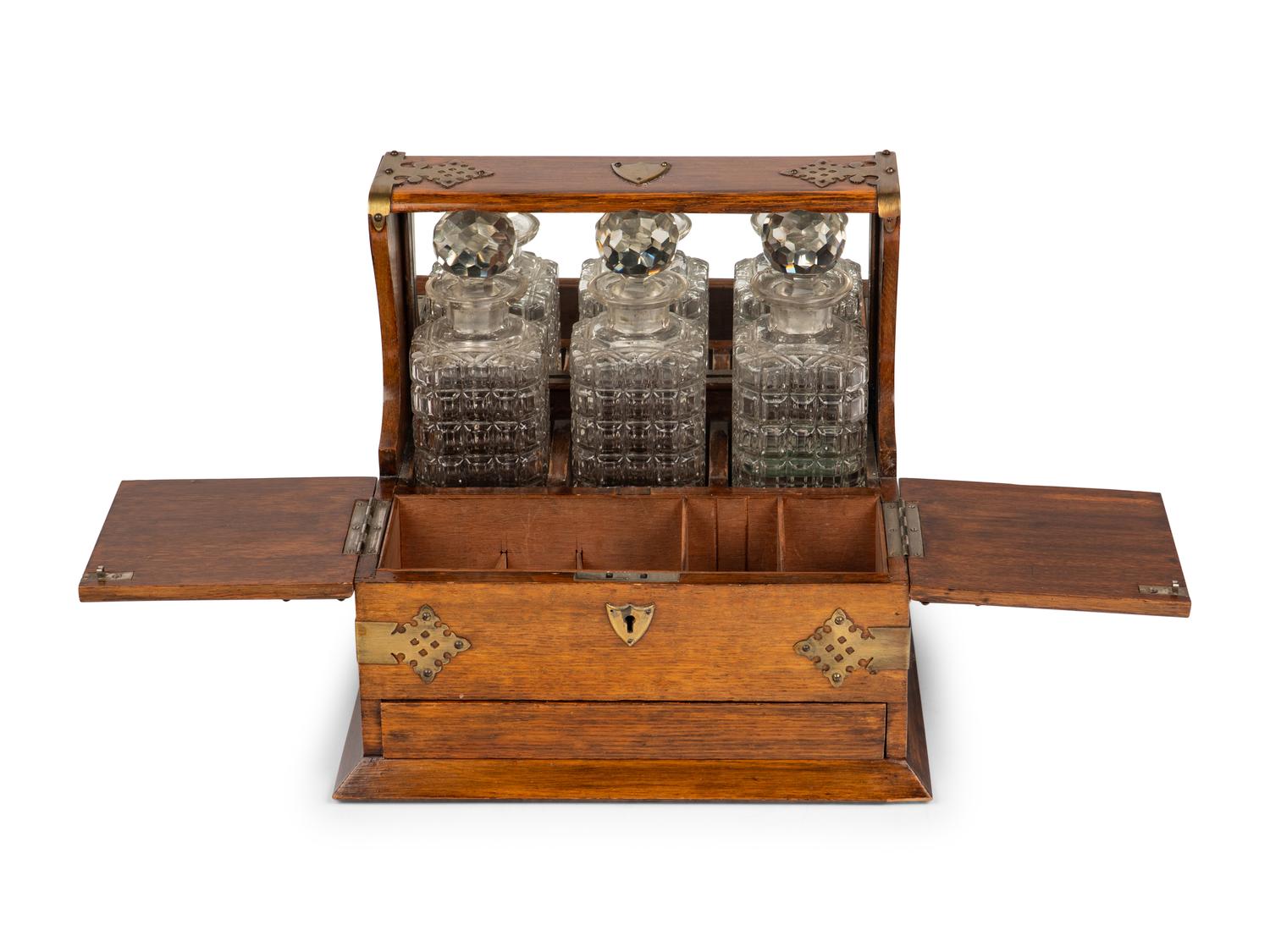 A Victorian Oak and Brass-Mounted Tantalus and a Walnut Letter Box