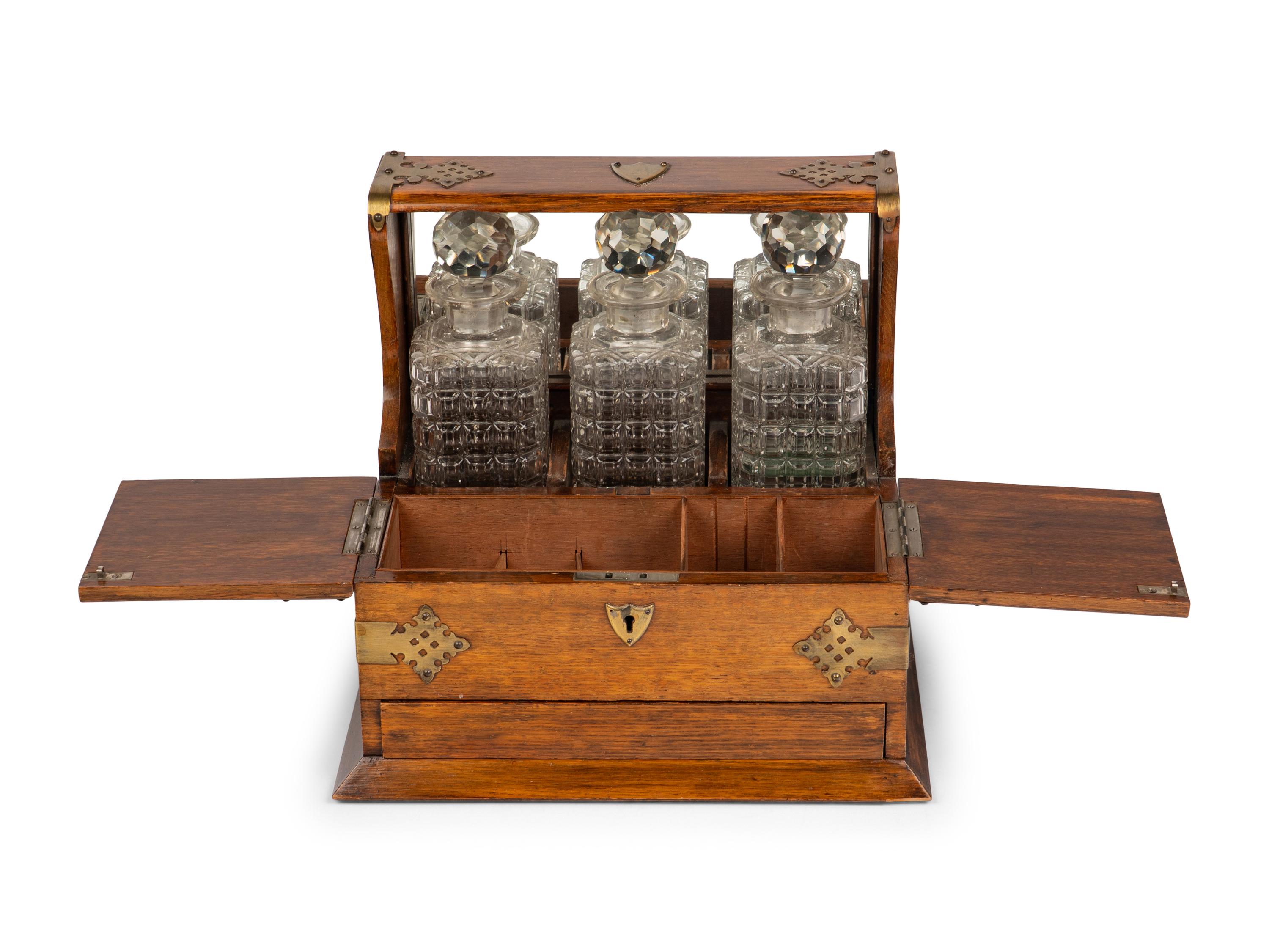 A Victorian Oak and Brass-Mounted Tantalus and a Walnut Letter Box