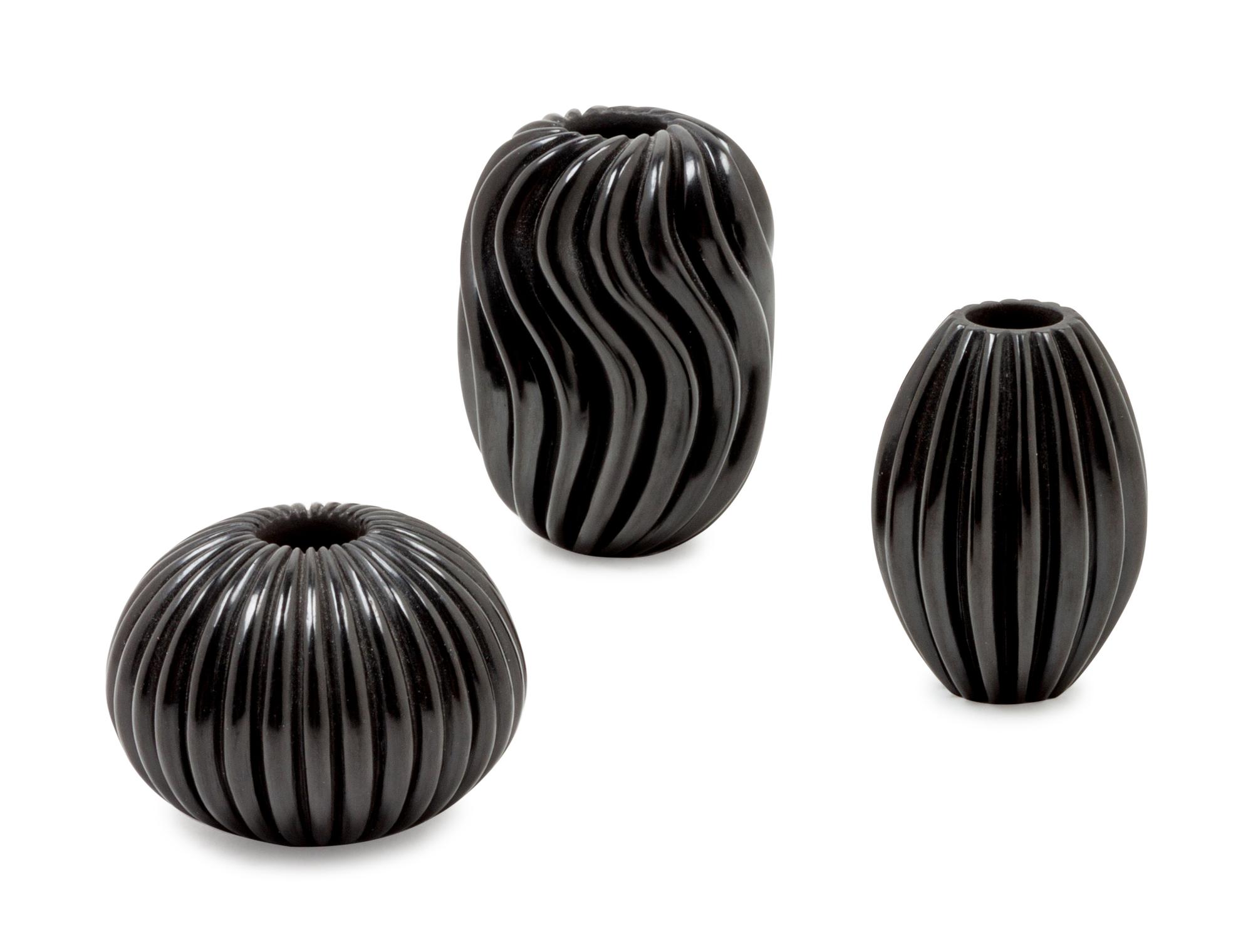 Group of Three Ribbed Vessels