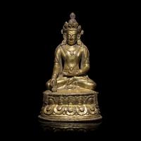 A Tibetan Gilt Copper Alloy Seated Figure of a Crowned Bodhisattva, 16th/17th Century 十六/十七世紀 西藏銅鎏金坐佛