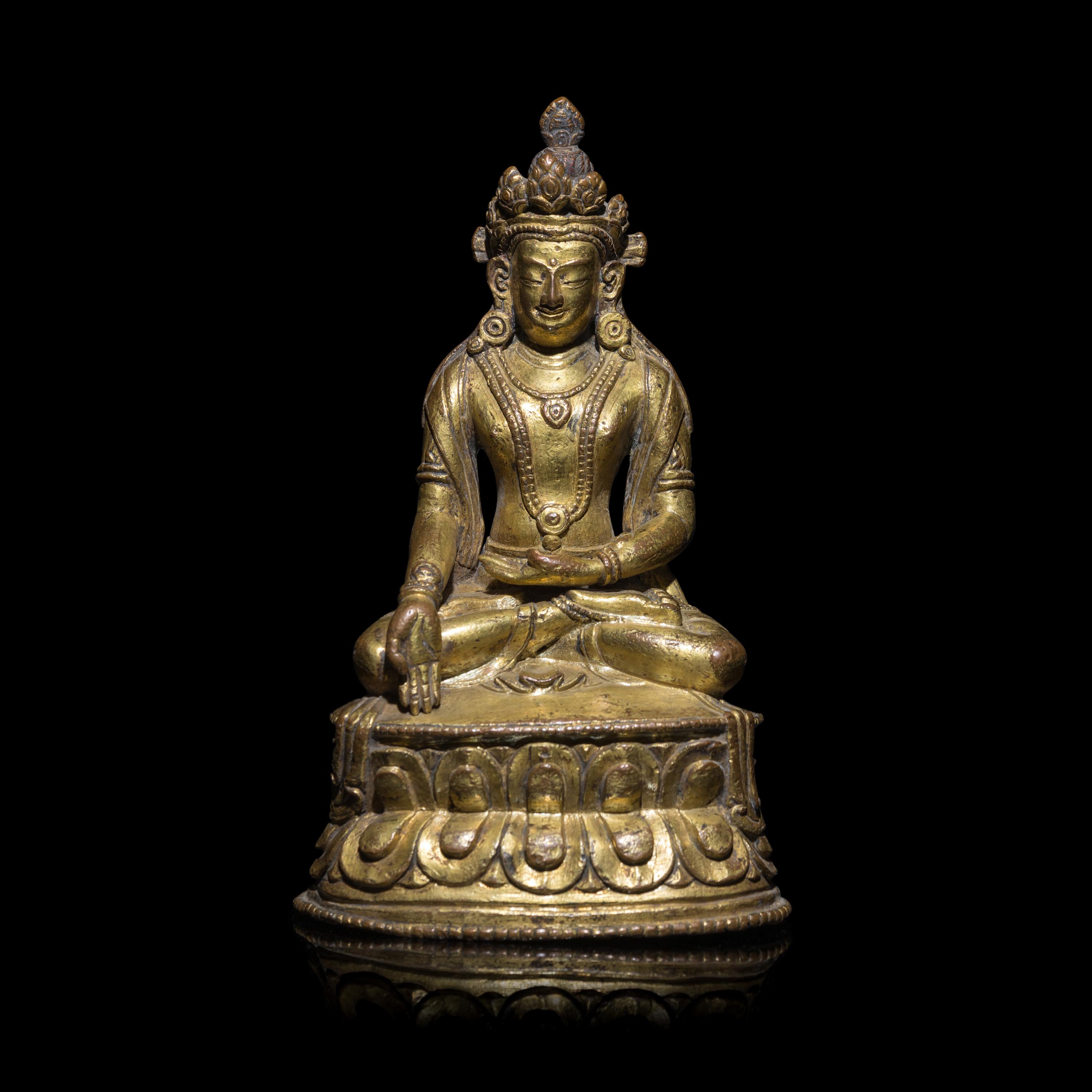 A Tibetan Gilt Copper Alloy Seated Figure of a Crowned Bodhisattva, 16th/17th Century 十六/十七世紀 西藏銅鎏金坐佛