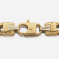 A gold, diamond, and coin necklace
