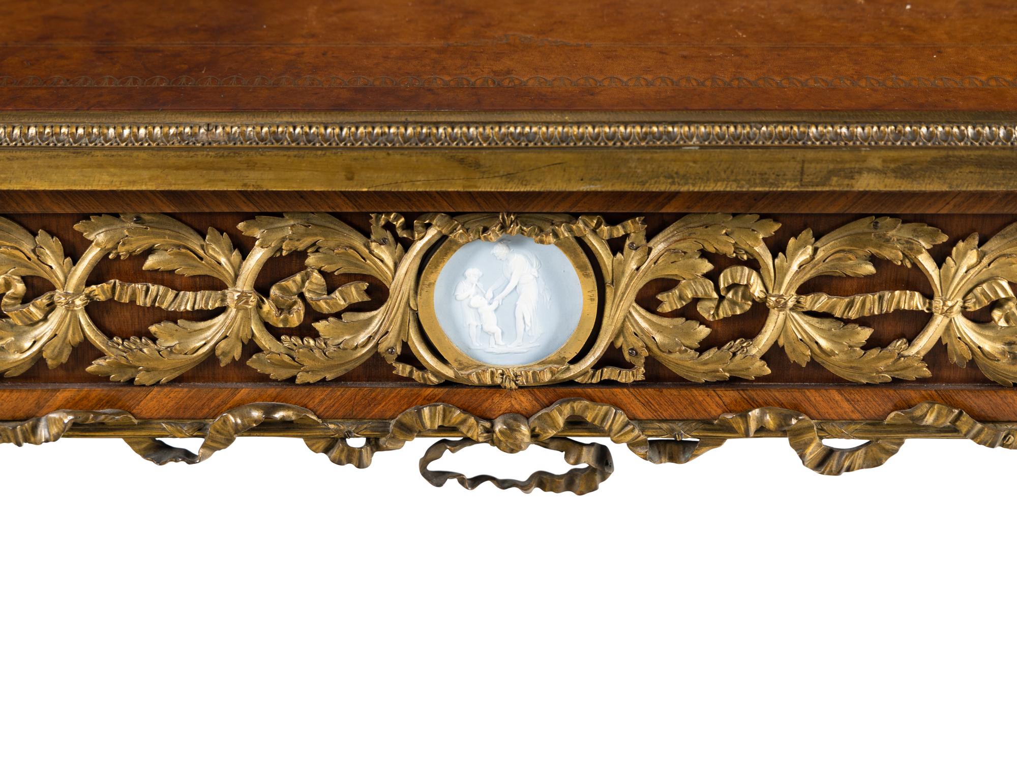 A French Gilt Bronze and Jasperware Mounted Kingwood and Parquetry Writing Table