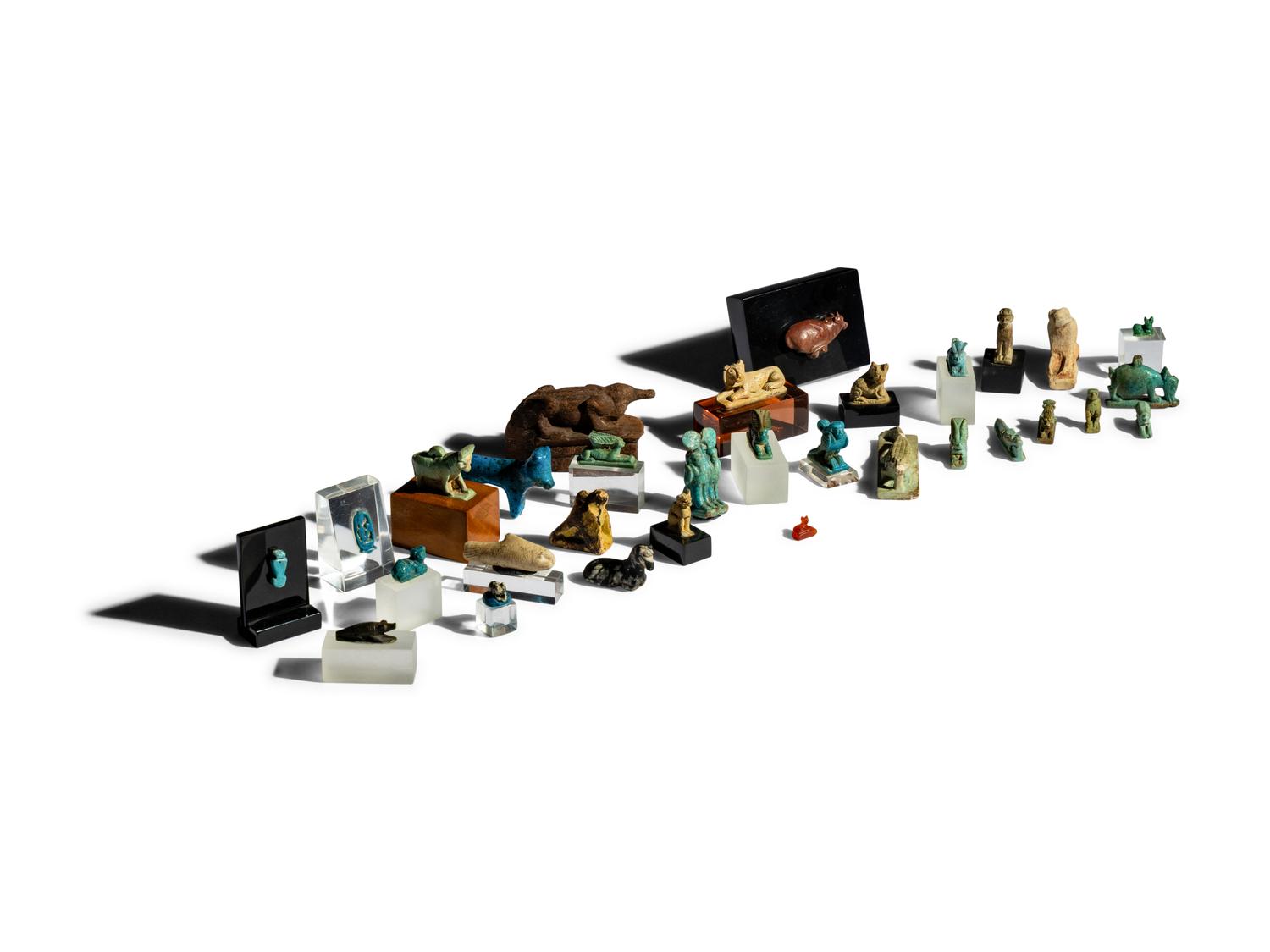 31 Egyptian Faience, Wood, and Stone Animals