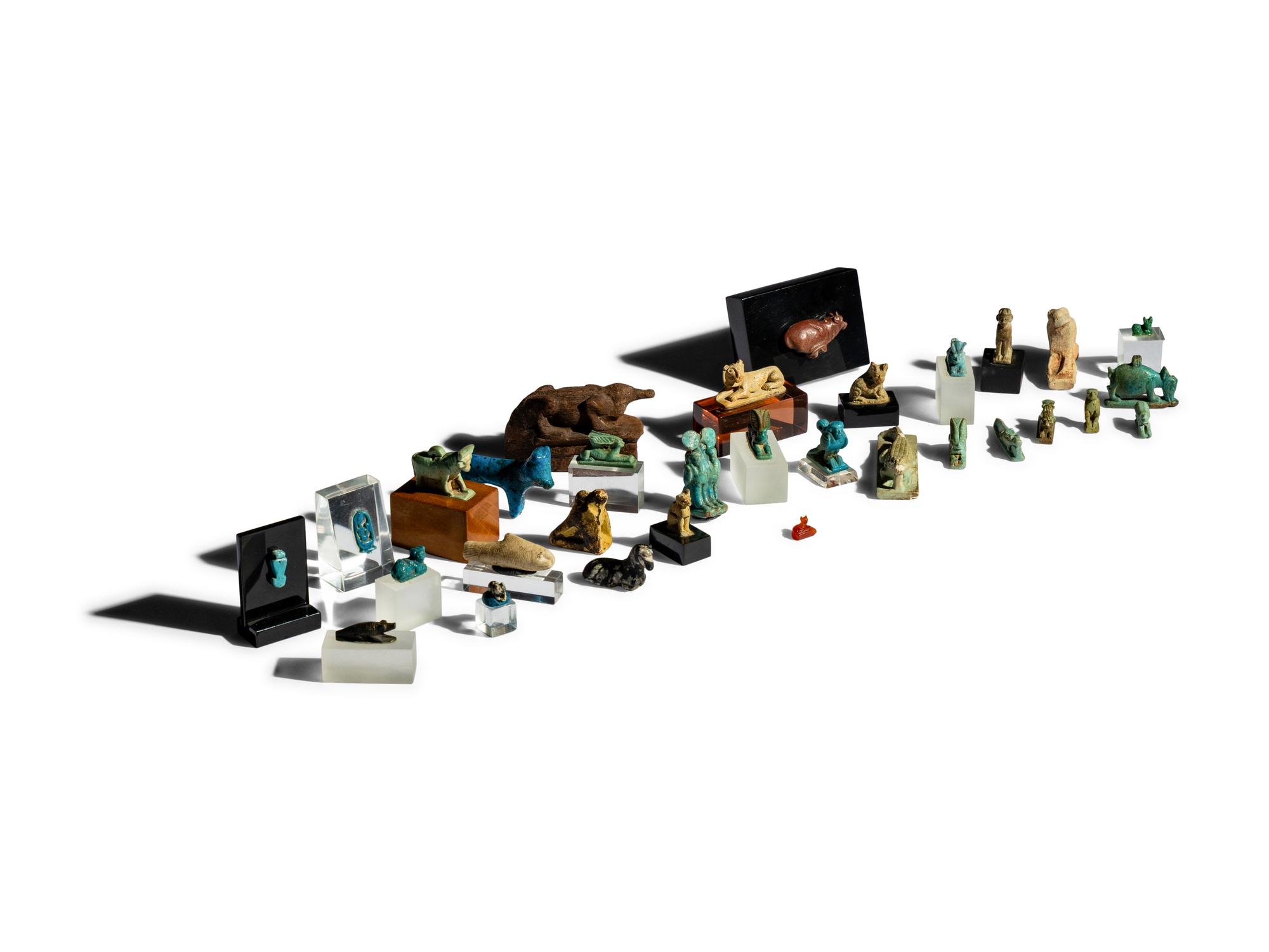 31 Egyptian Faience, Wood, and Stone Animals
