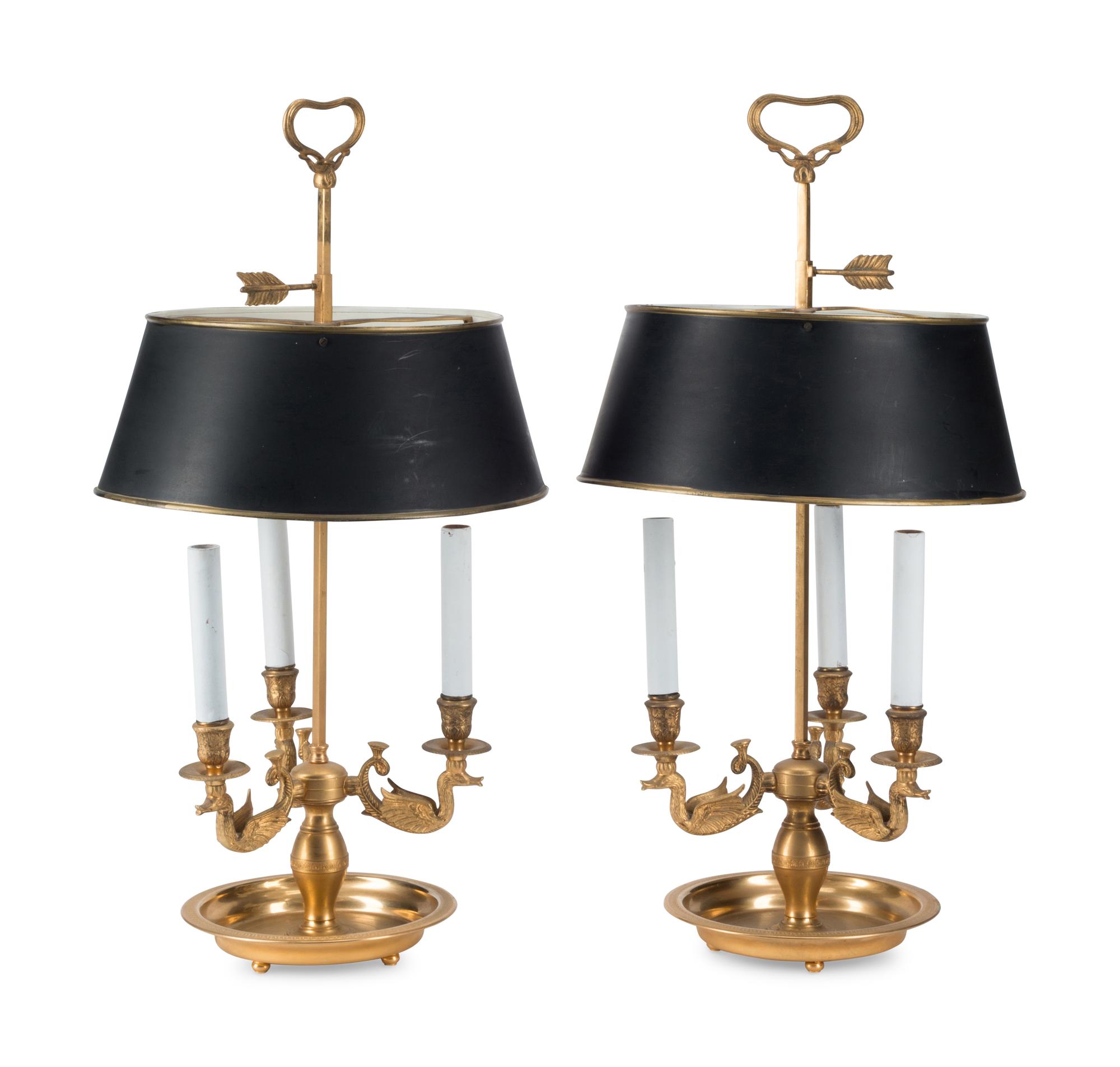 A Pair of French Gilt Metal and Tole Bouillotte Lamps