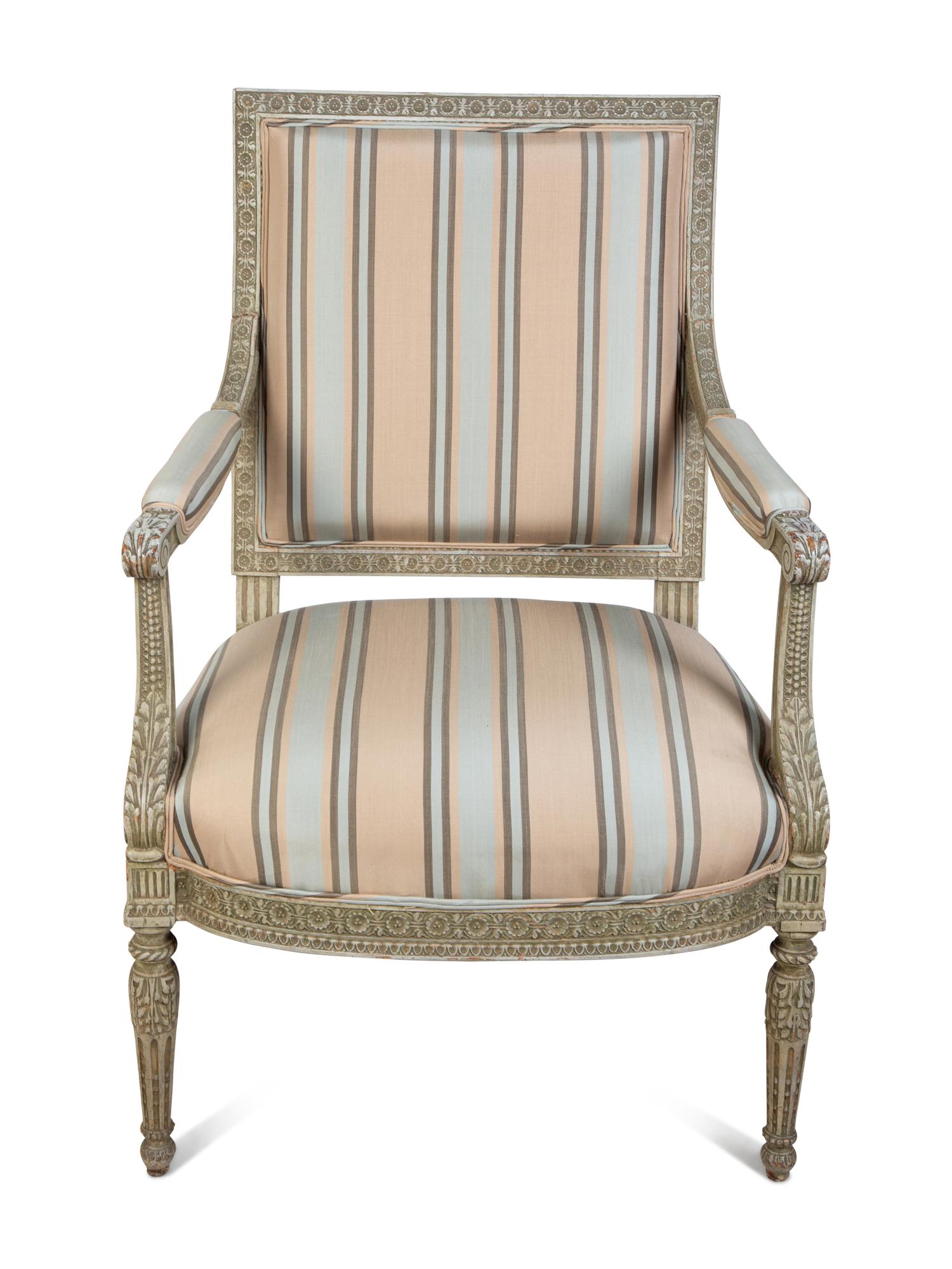 A Louis XVI Style Carved and Painted Fauteuil — 19TH CENTURY
