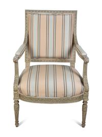 A Louis XVI Style Carved and Painted Fauteuil — 19TH CENTURY