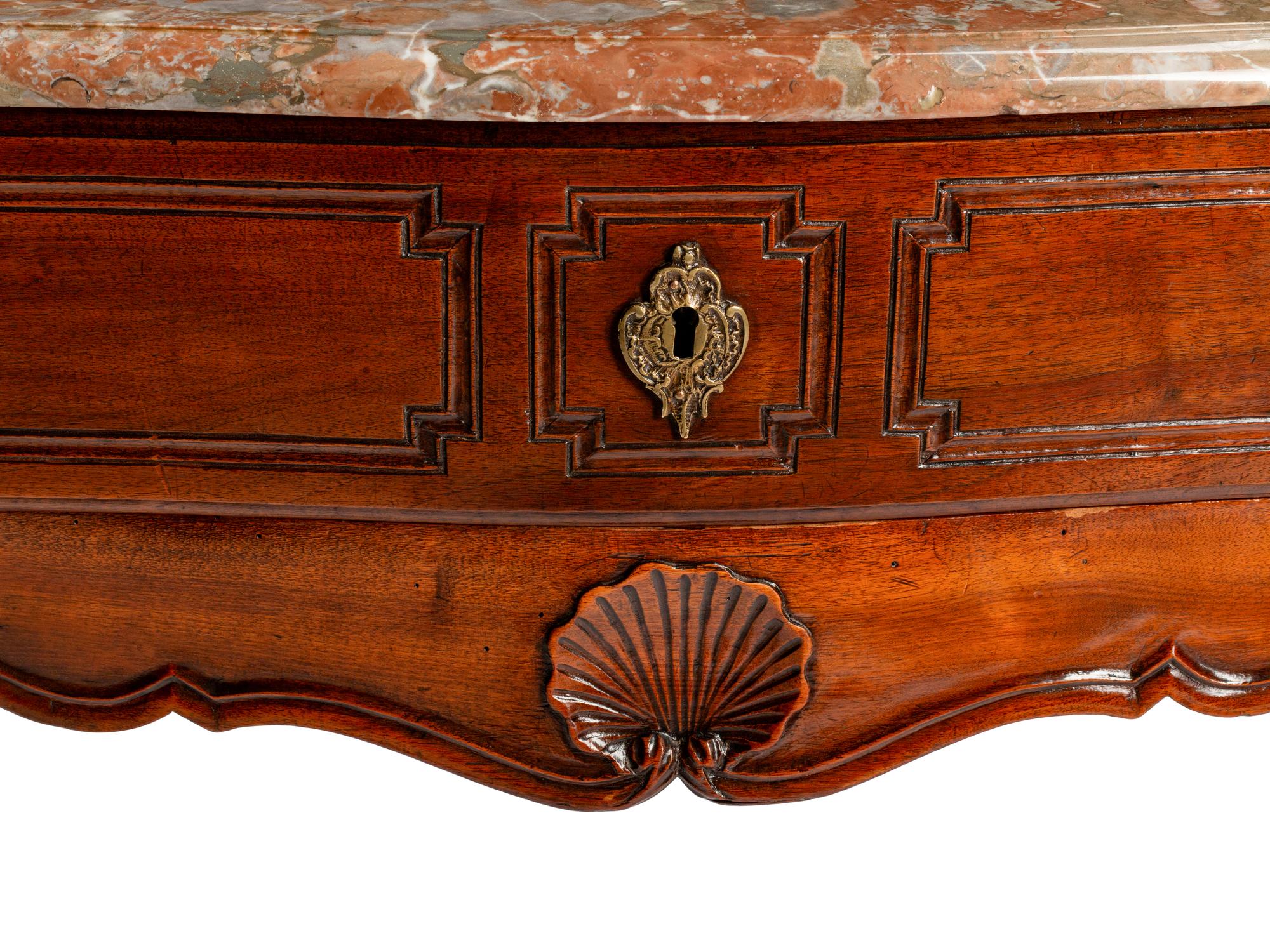 A Louis XV Provincial Carved Walnut Table