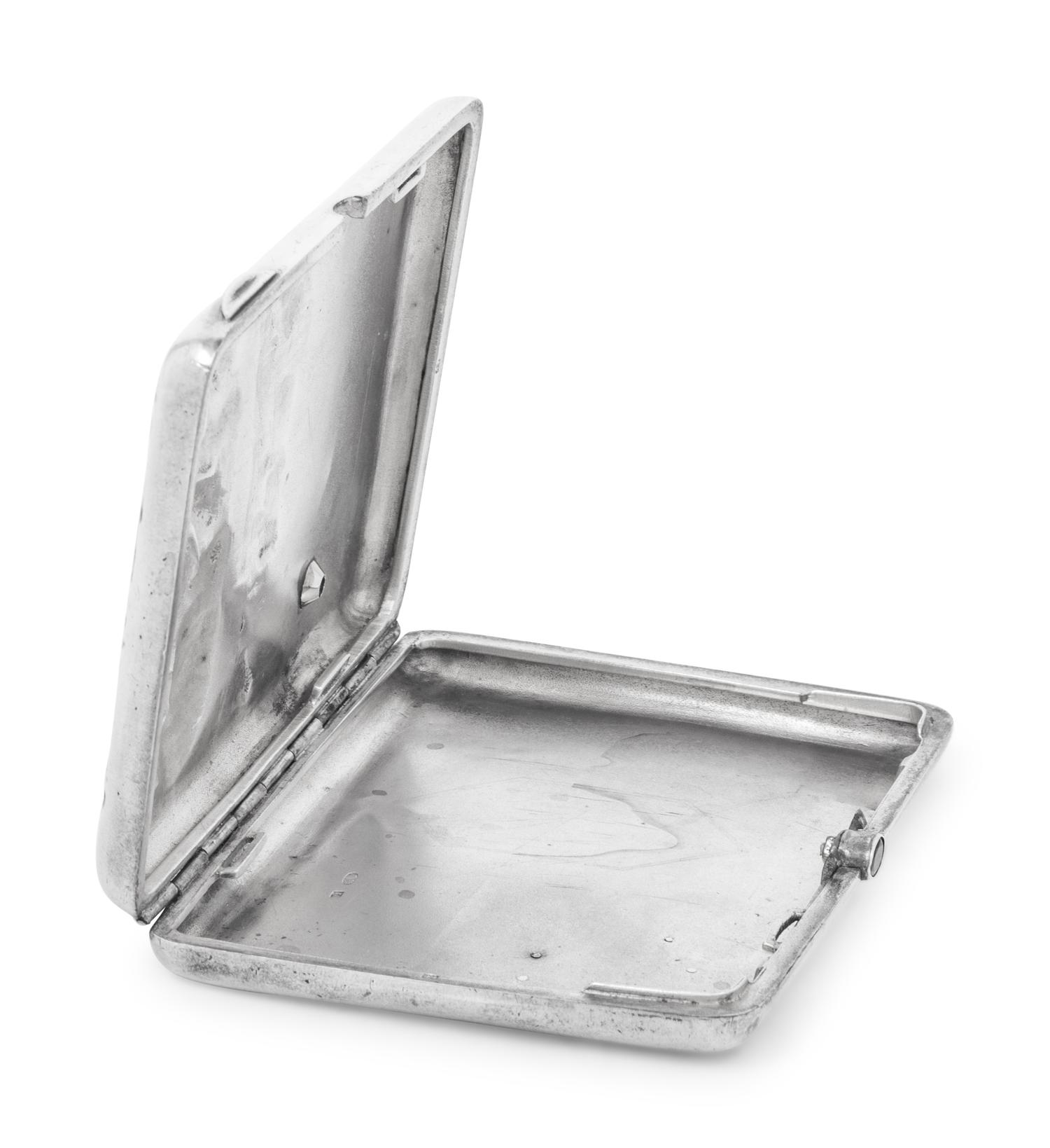 A Russian Silver and Emerald-Inset Cigarette Case
