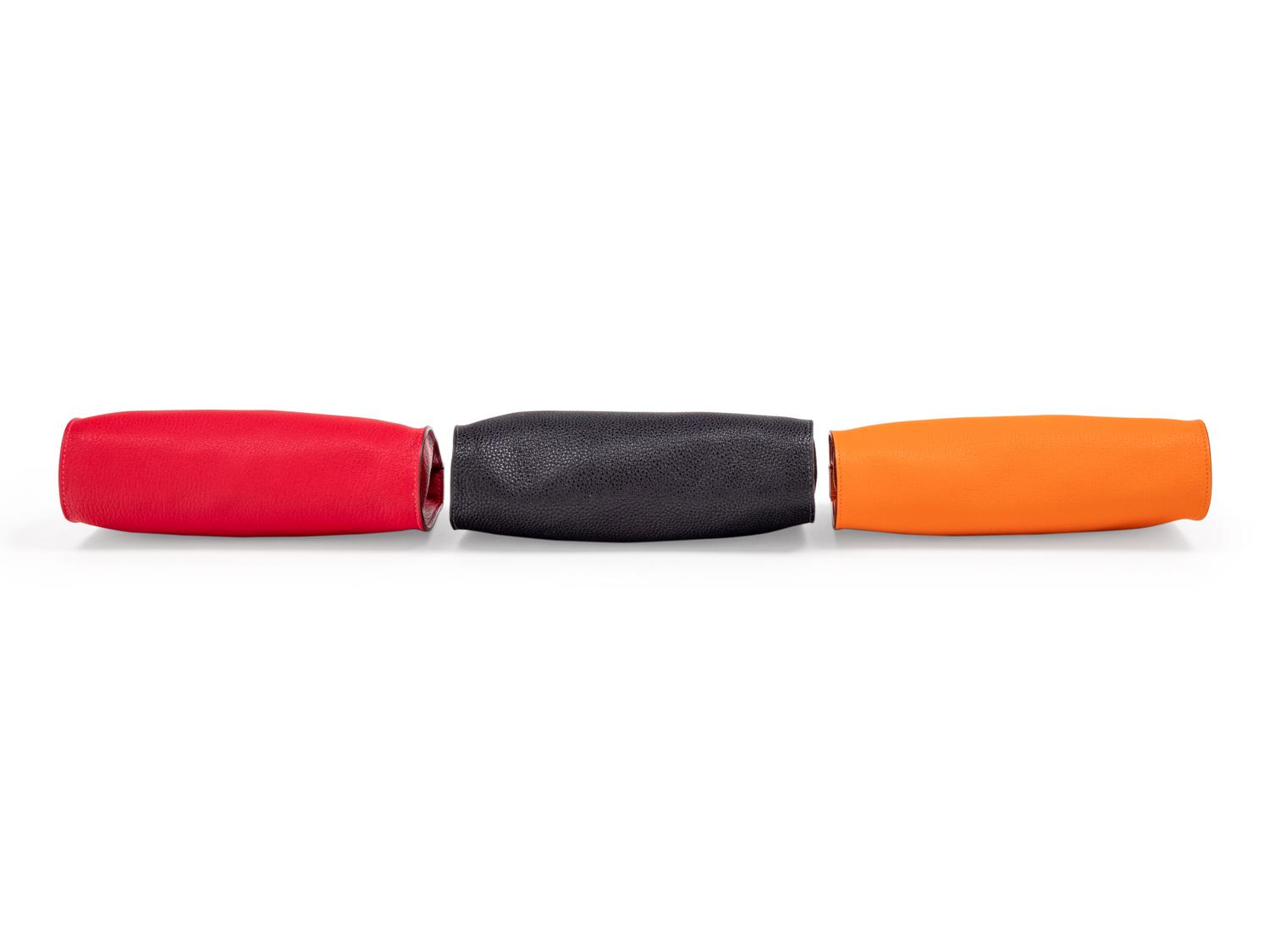 Three Hermès Leather Karo Trousse Cosmetic Bags, 2000-2013