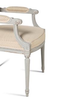 A Set of Ten Louis XVI Style Gray Painted Dining Chairs