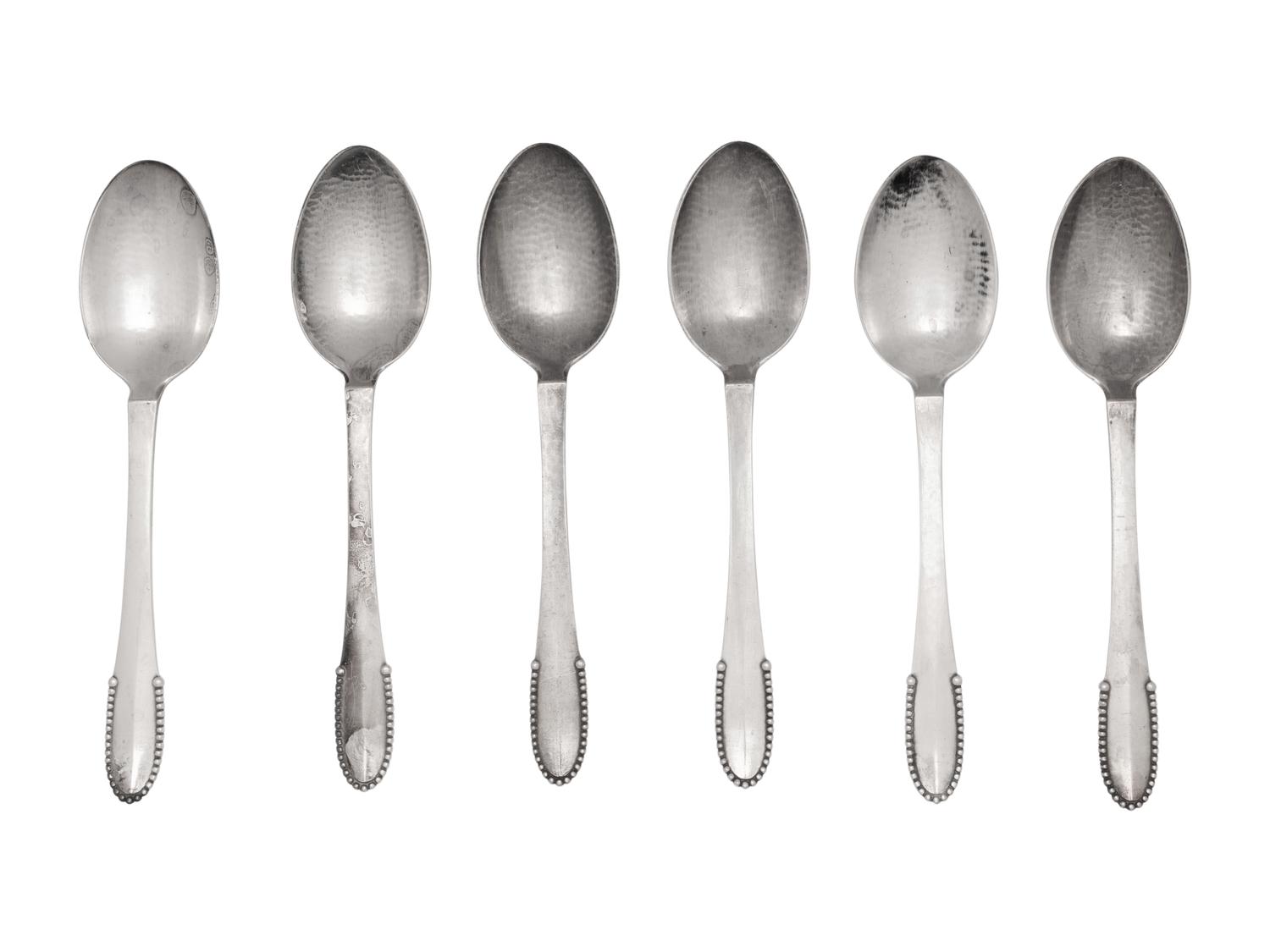 A Set of Six Georg Jensen Beaded Pattern Dessert Spoons