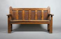 A Gothic Revival Oak Bench, Height 39 1/2 x width 65 3/4 x depth 20 inches.