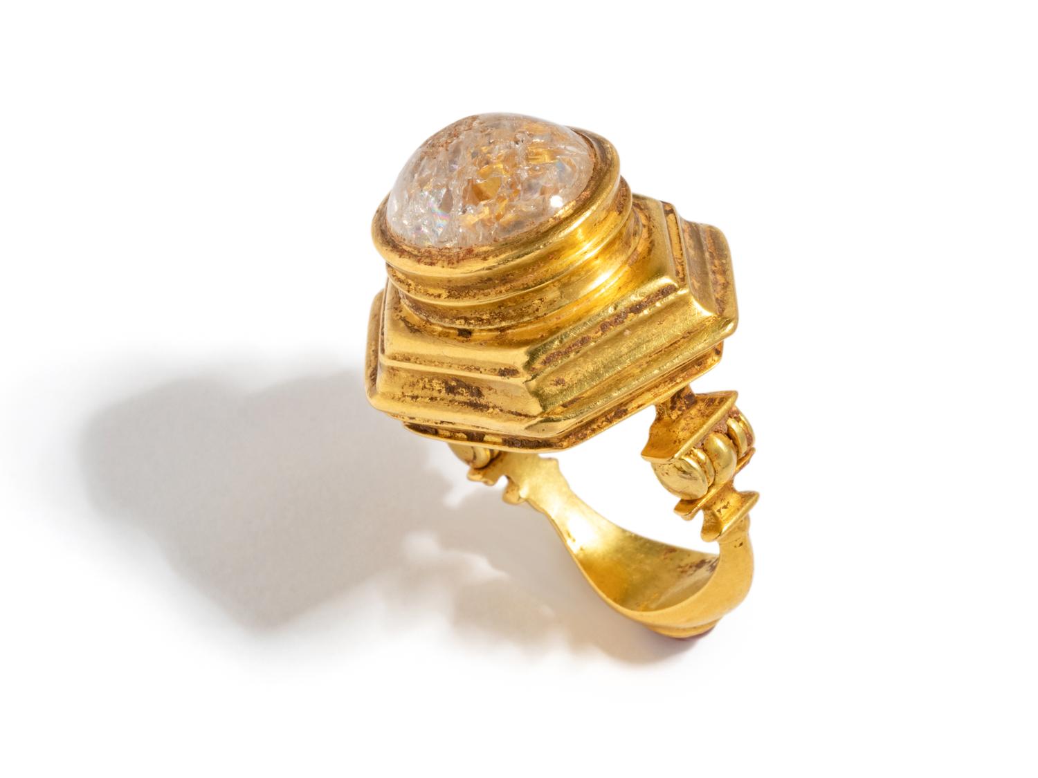 A Hellenistic Gold Finger Ring — with cabochon rock crystal and garnet