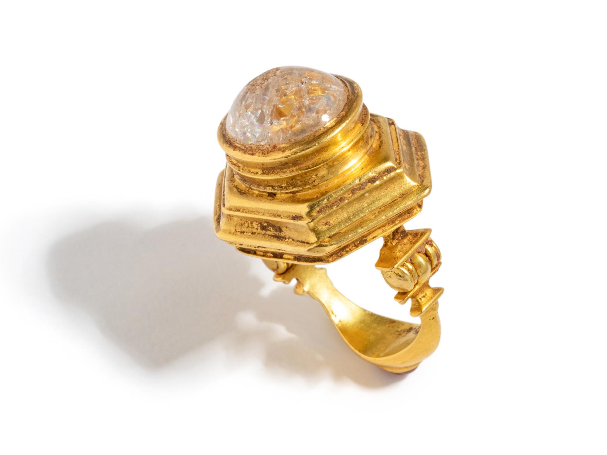 A Hellenistic Gold Finger Ring — with cabochon rock crystal and garnet