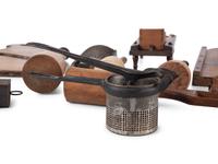 A Group of Wood and Tin Graters, Slicers and Pounders