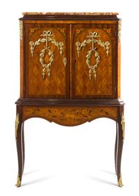 A Louis XV/XVI Transitional Style Gilt Bronze Mounted Parquetry Cabinet Height 51 1/2 x width 32 1/2 x depth 17 inches. — 20TH CENTURY WITH EARLIER ELEMENTS