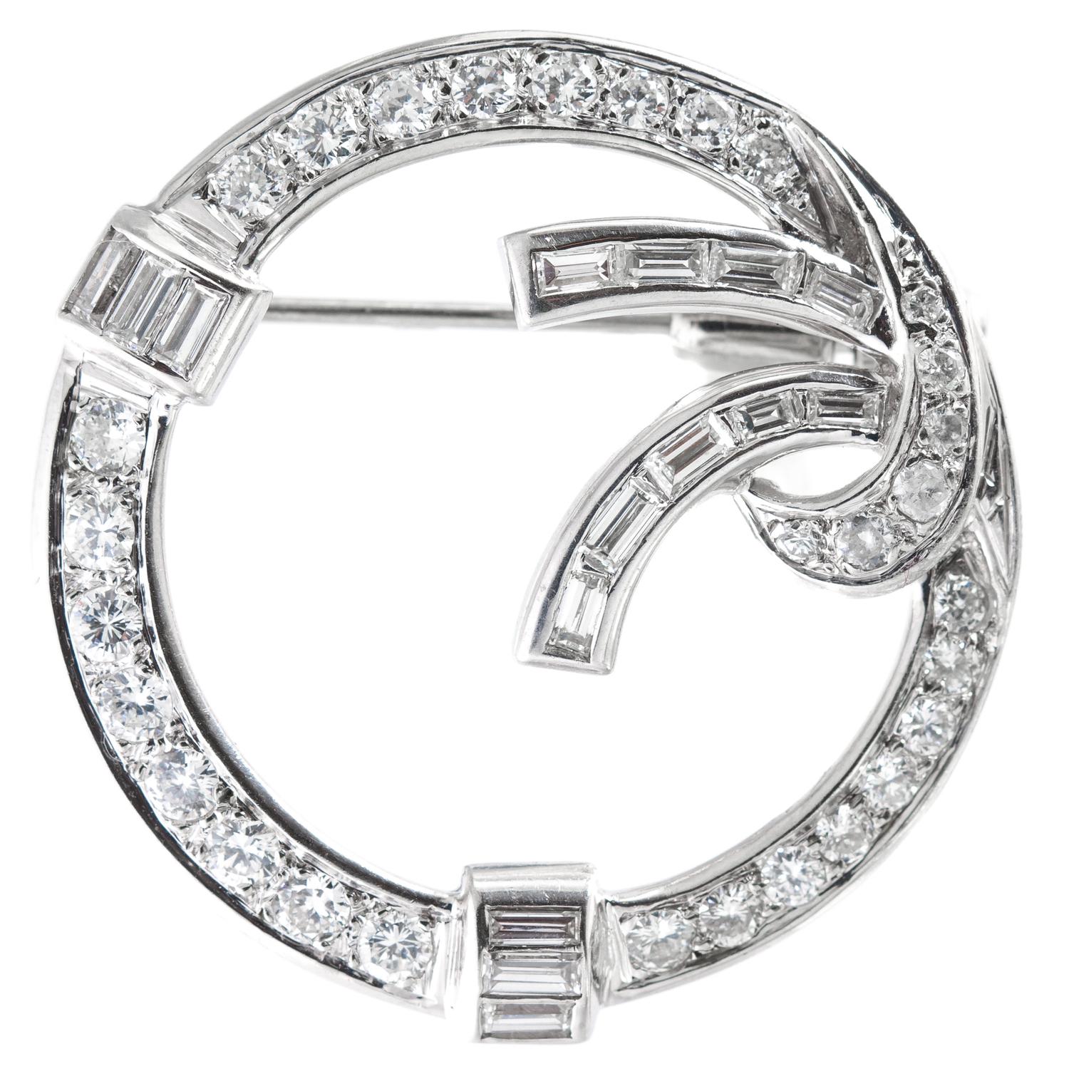 A White Gold and Diamond Circle Brooch, 5.20 dwts.