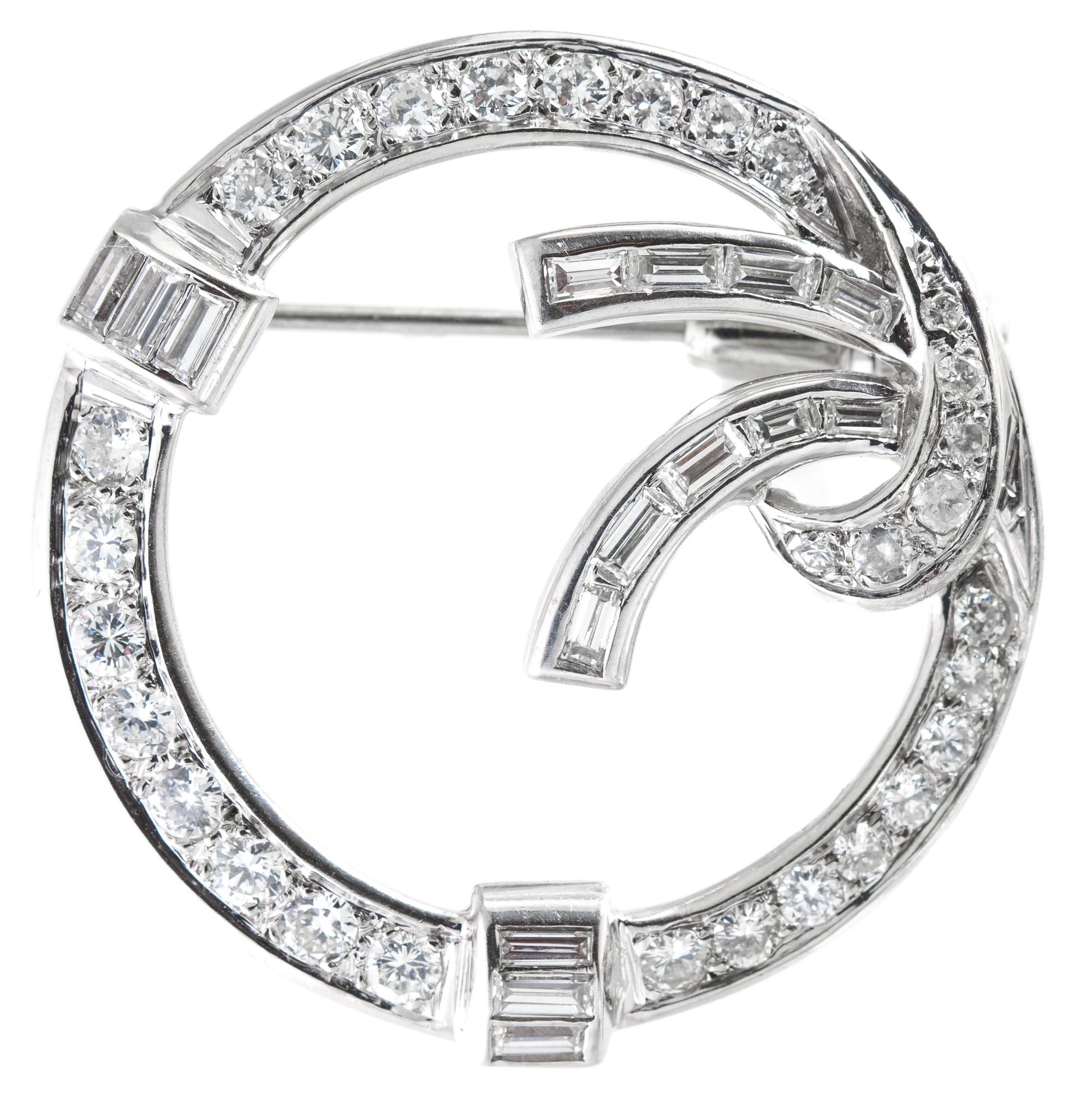 A White Gold and Diamond Circle Brooch, 5.20 dwts.