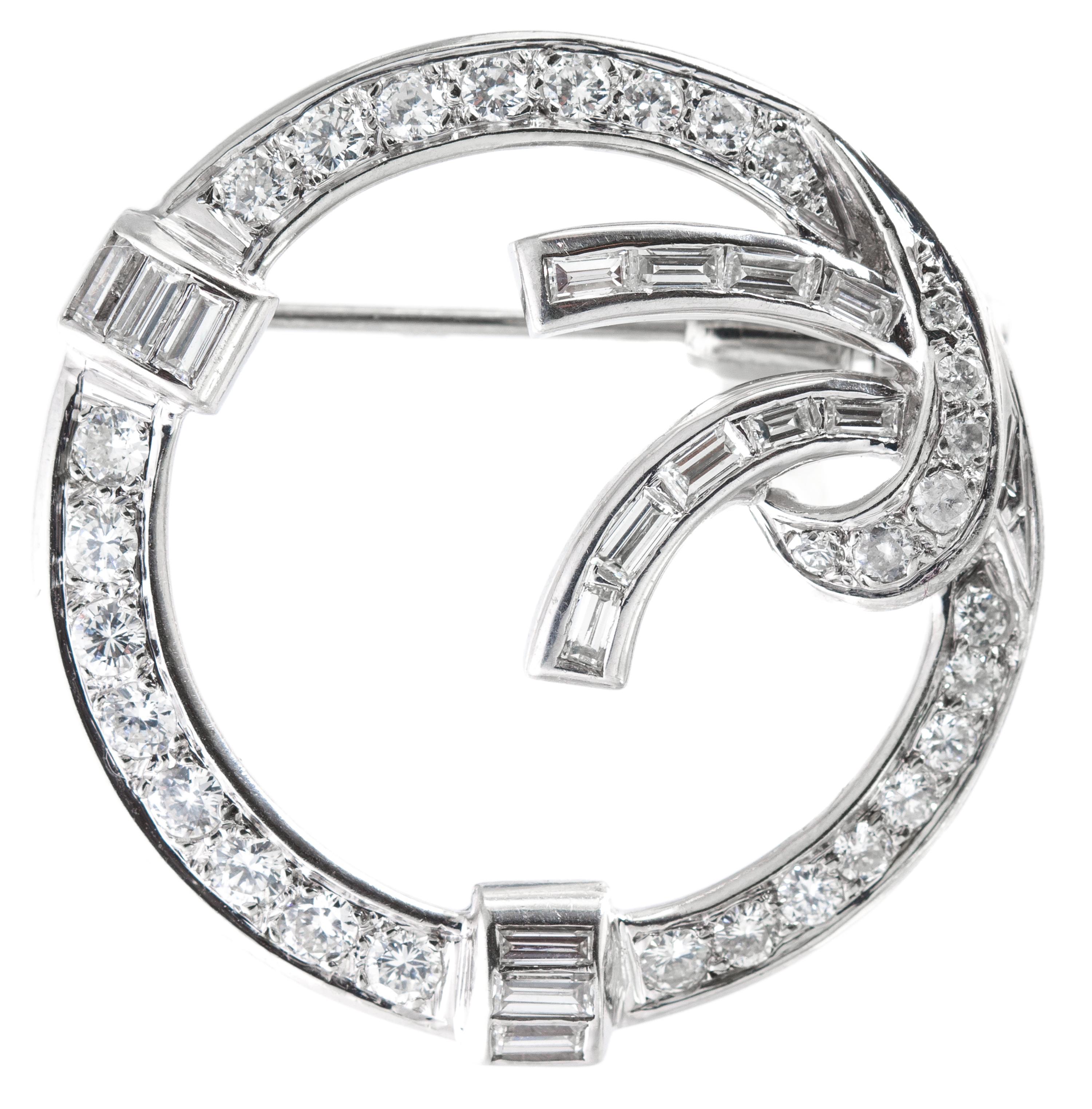 A White Gold and Diamond Circle Brooch, 5.20 dwts.