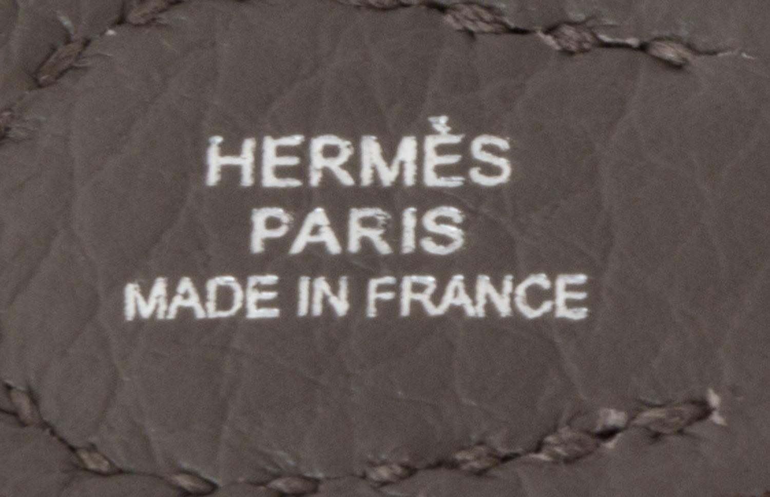 An Hermes Amazone Etain Taurillon Clemence Mini Evelyne Handbag, 6.7" x 7" x 2".