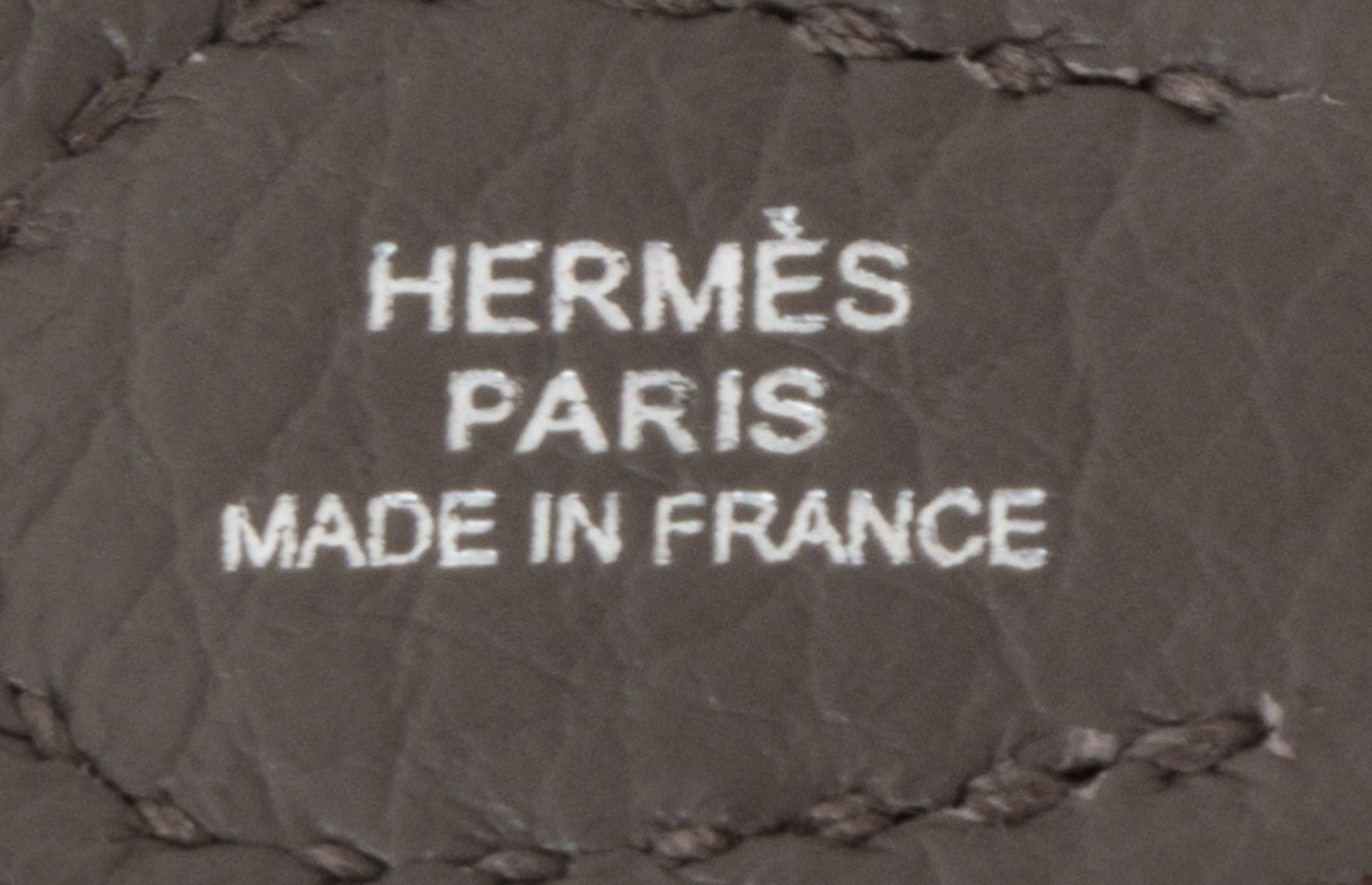 An Hermes Amazone Etain Taurillon Clemence Mini Evelyne Handbag, 6.7" x 7" x 2".