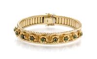 A 14 Karat Yellow Gold and Emerald Bracelet, Italy, 21.40 dwts.
