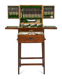 An Extensive Silver-Plate Flatware and Tea Service in a Fitted Wooden Case on Mahogany Stand