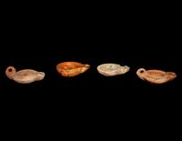 Four Roman Molded Terra Cotta Oil Lamps
