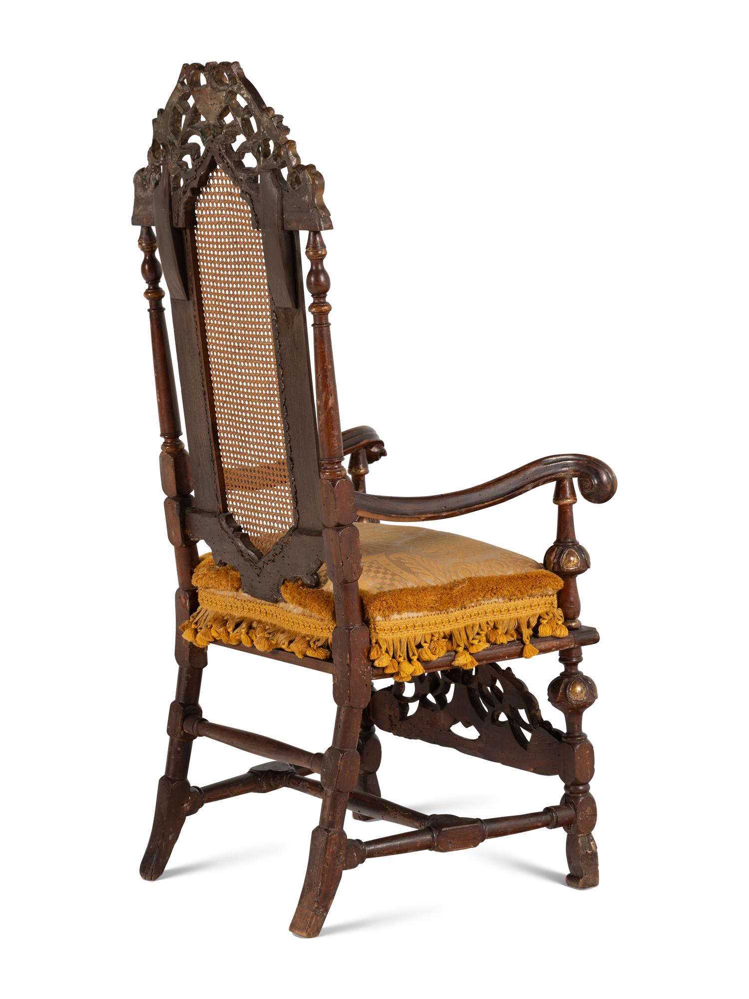 A Pair of William and Mary Style Parcel Gilt Caned and Pierced-Carved Beechwood Armchairs