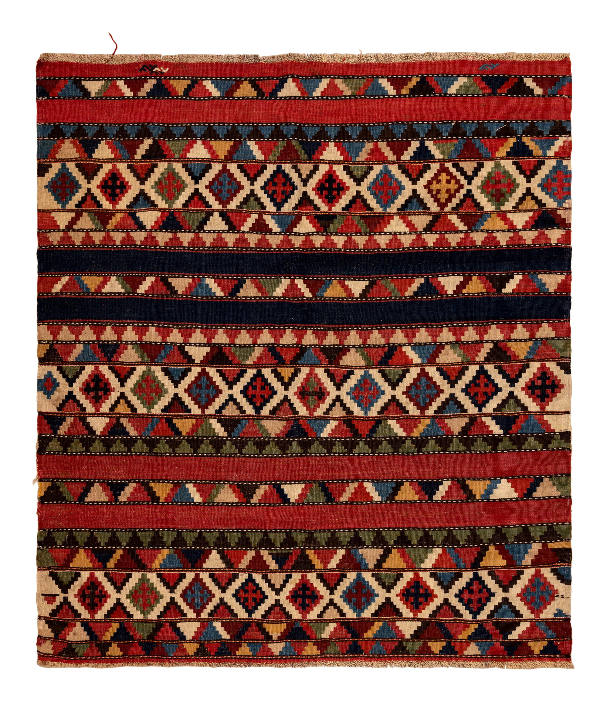 A Group of Three Kilim Rugs