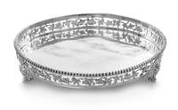 A French Silver Wine Coaster, Alphonse Debain, Paris, First Quarter 20th Century, having a beaded rim and an openwork gallery worked to