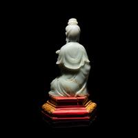 A Chinese Celadon Jade Seated Guanyin, 20th Century — 近代 青玉觀音坐像