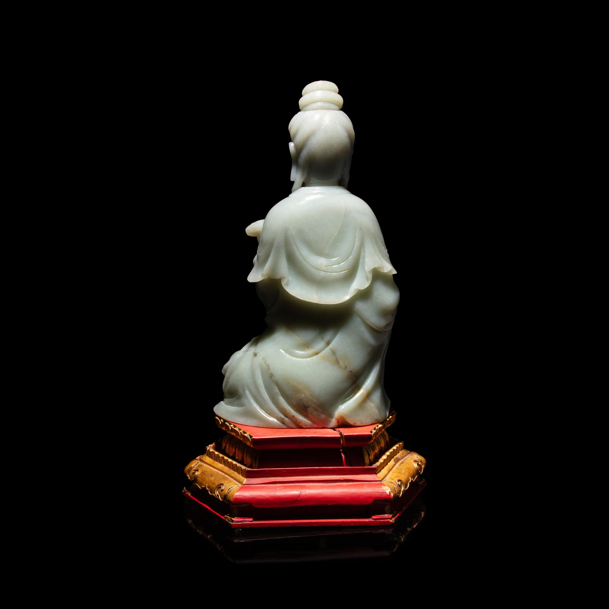 A Chinese Celadon Jade Seated Guanyin, 20th Century — 近代 青玉觀音坐像