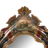 A Venetian Rococo Style Polychrome Painted and Parcel Gilt Mirror