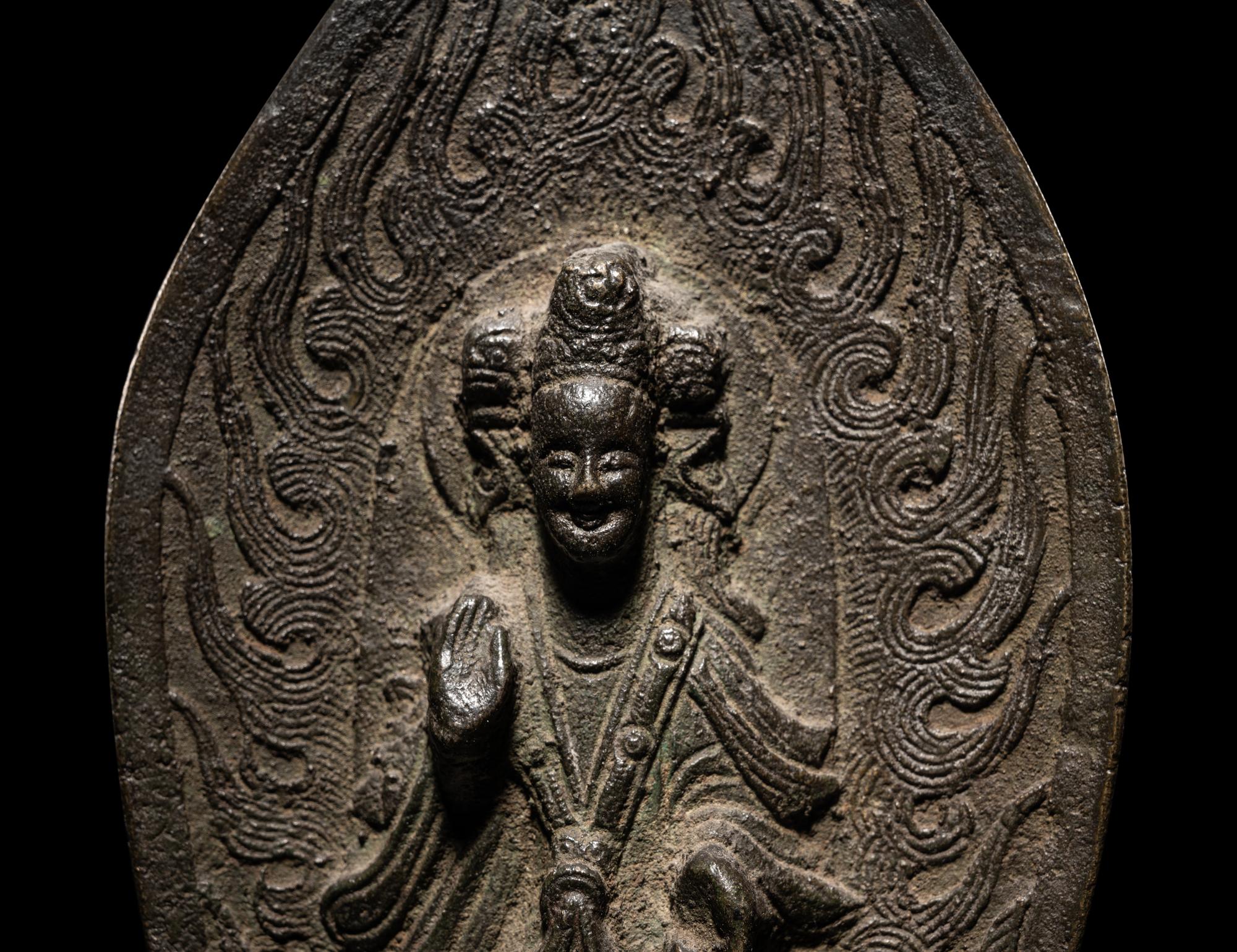 A Bronze Votive Figure of Buddha