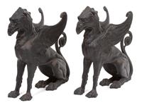 A Pair of Patinated Iron Gryphons Height 22 1/2 inches. — 20TH CENTURY