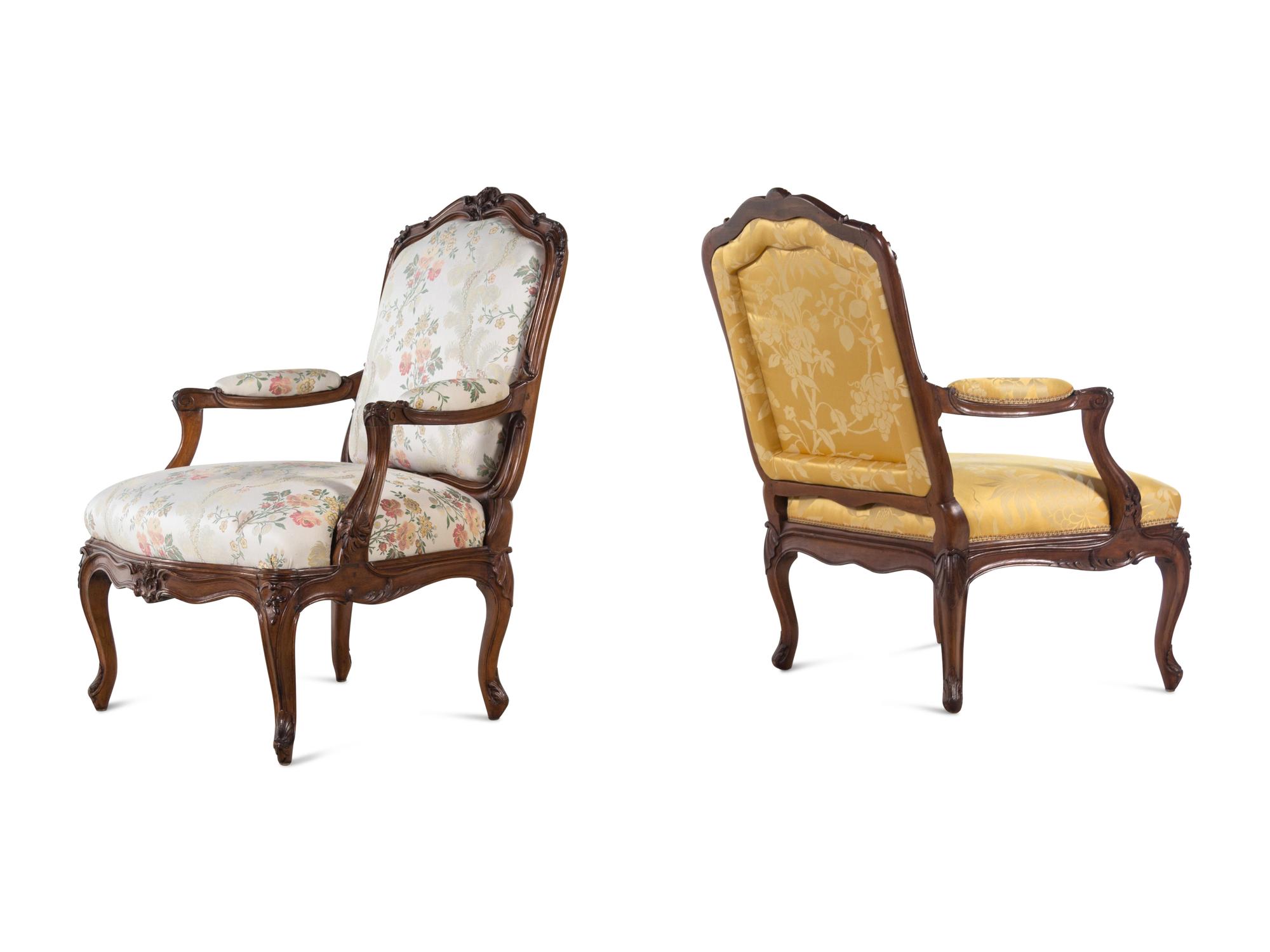A Set of Four Louis XV Style Walnut Fauteuils