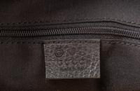 Five Gucci Items: Two Bags, Two Wallets, One Passport Holder, 2010s