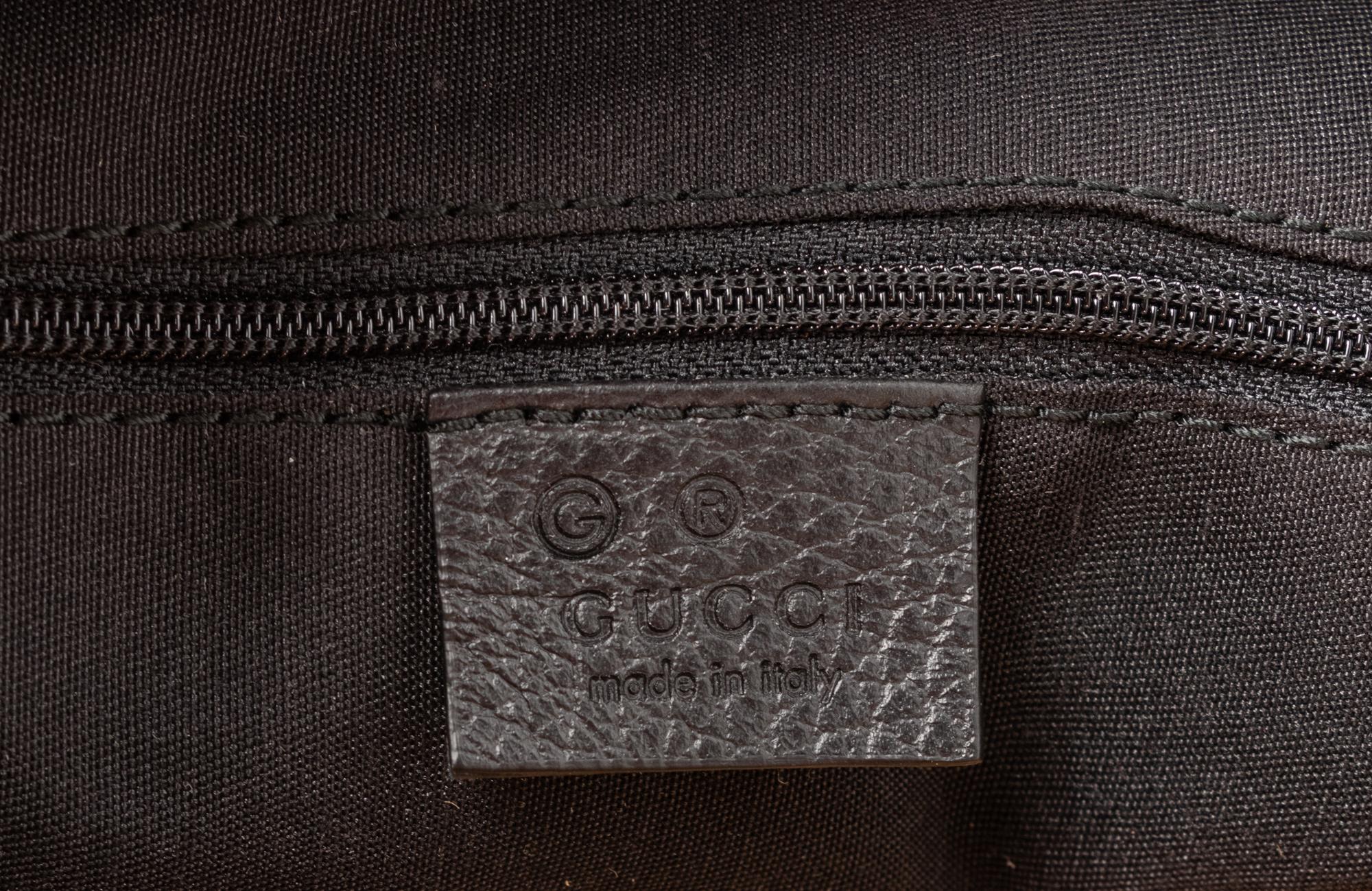 Five Gucci Items: Two Bags, Two Wallets, One Passport Holder, 2010s