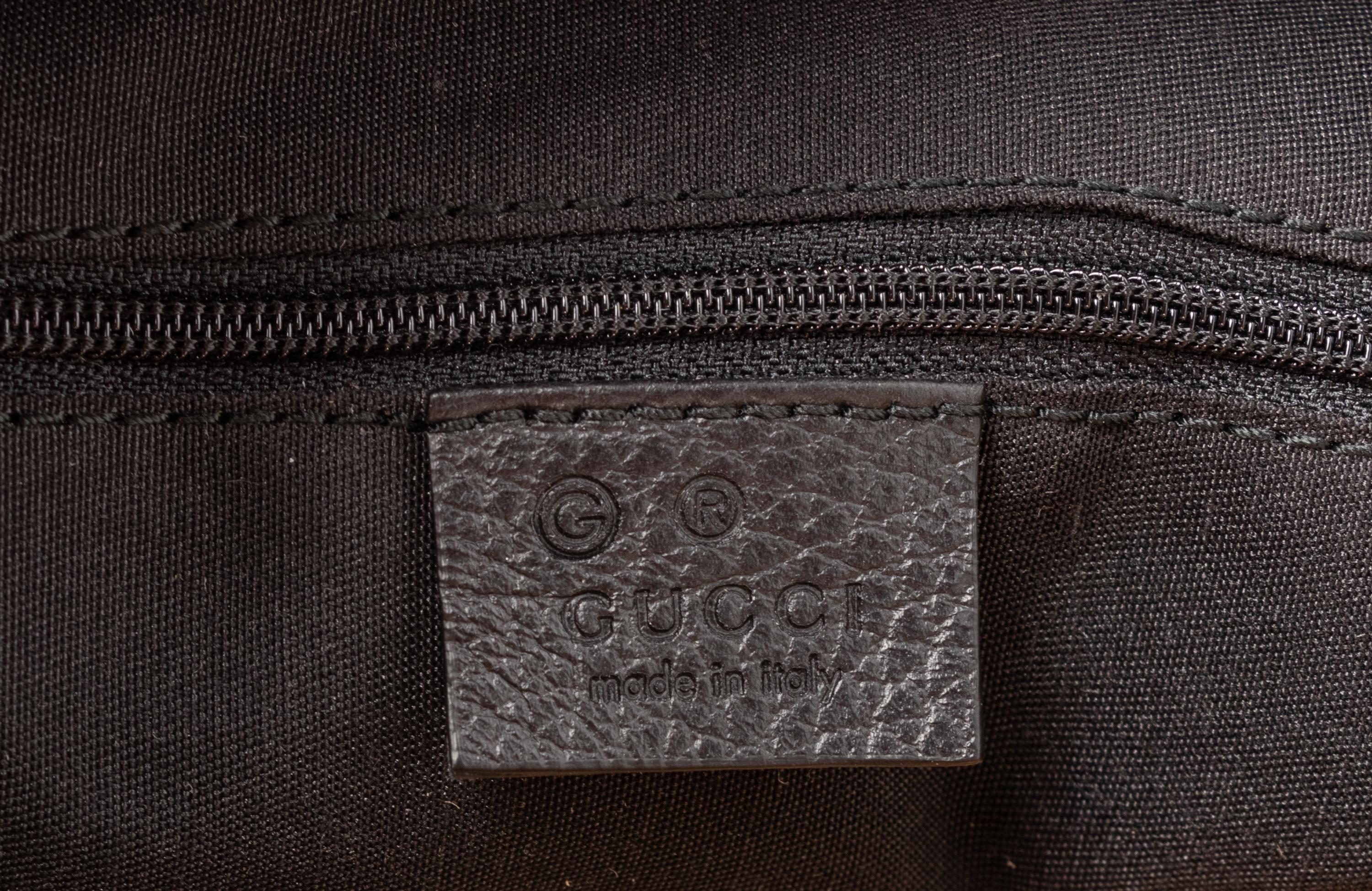 Five Gucci Items: Two Bags, Two Wallets, One Passport Holder, 2010s