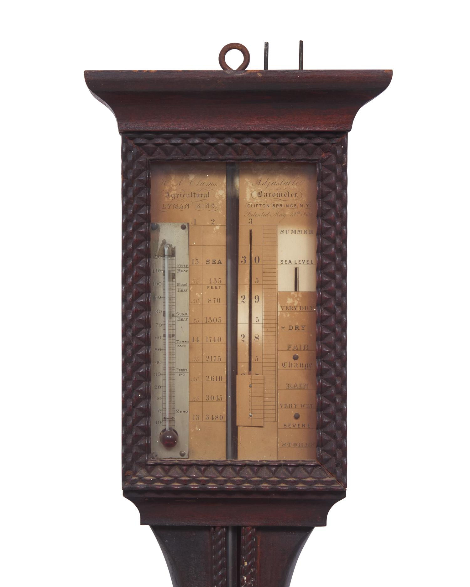 A Carved Mahogany Adjustable Barometer
