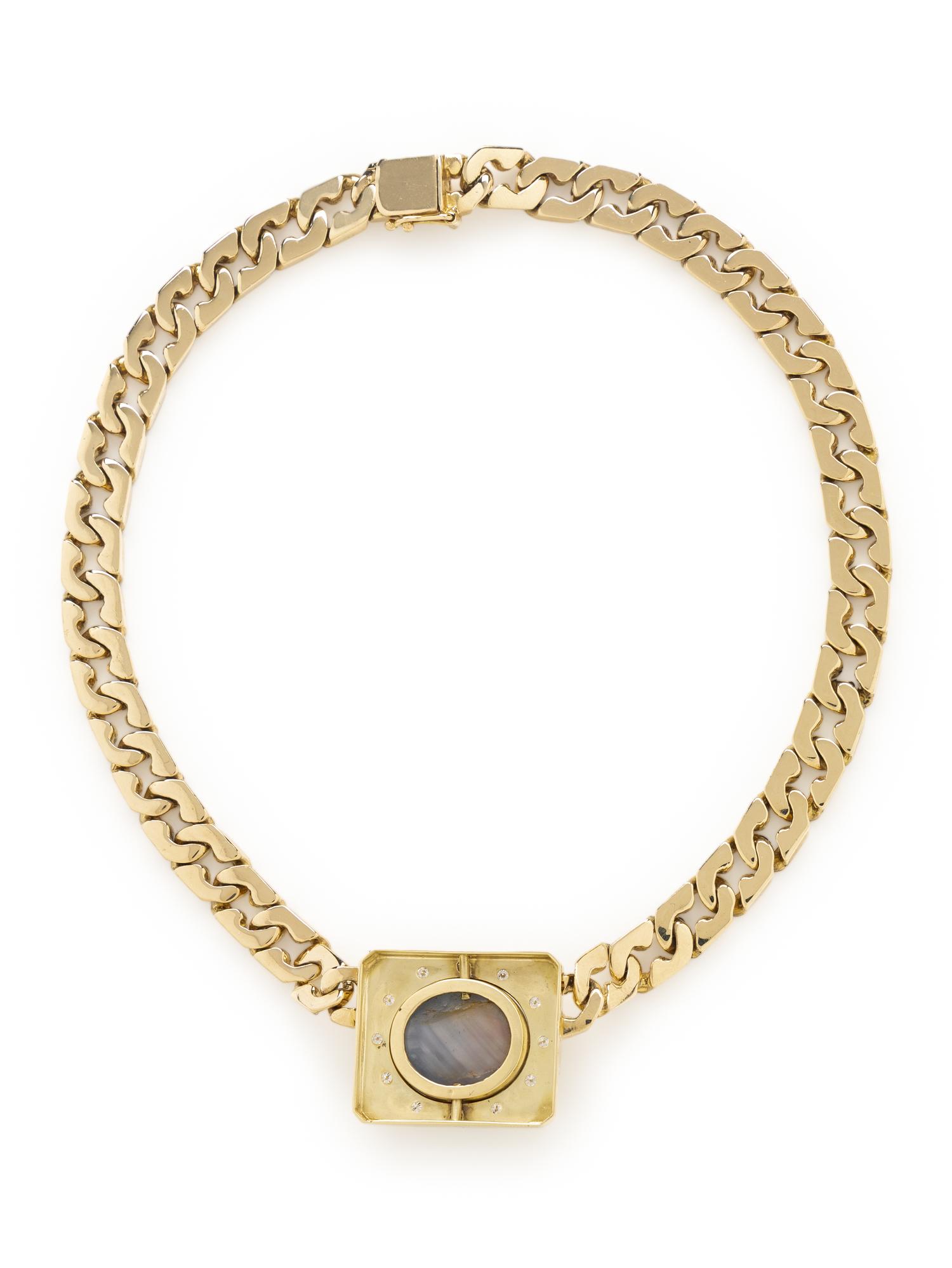 YELLOW GOLD, STAR SAPPHIRE, AND DIAMOND NECKLACE