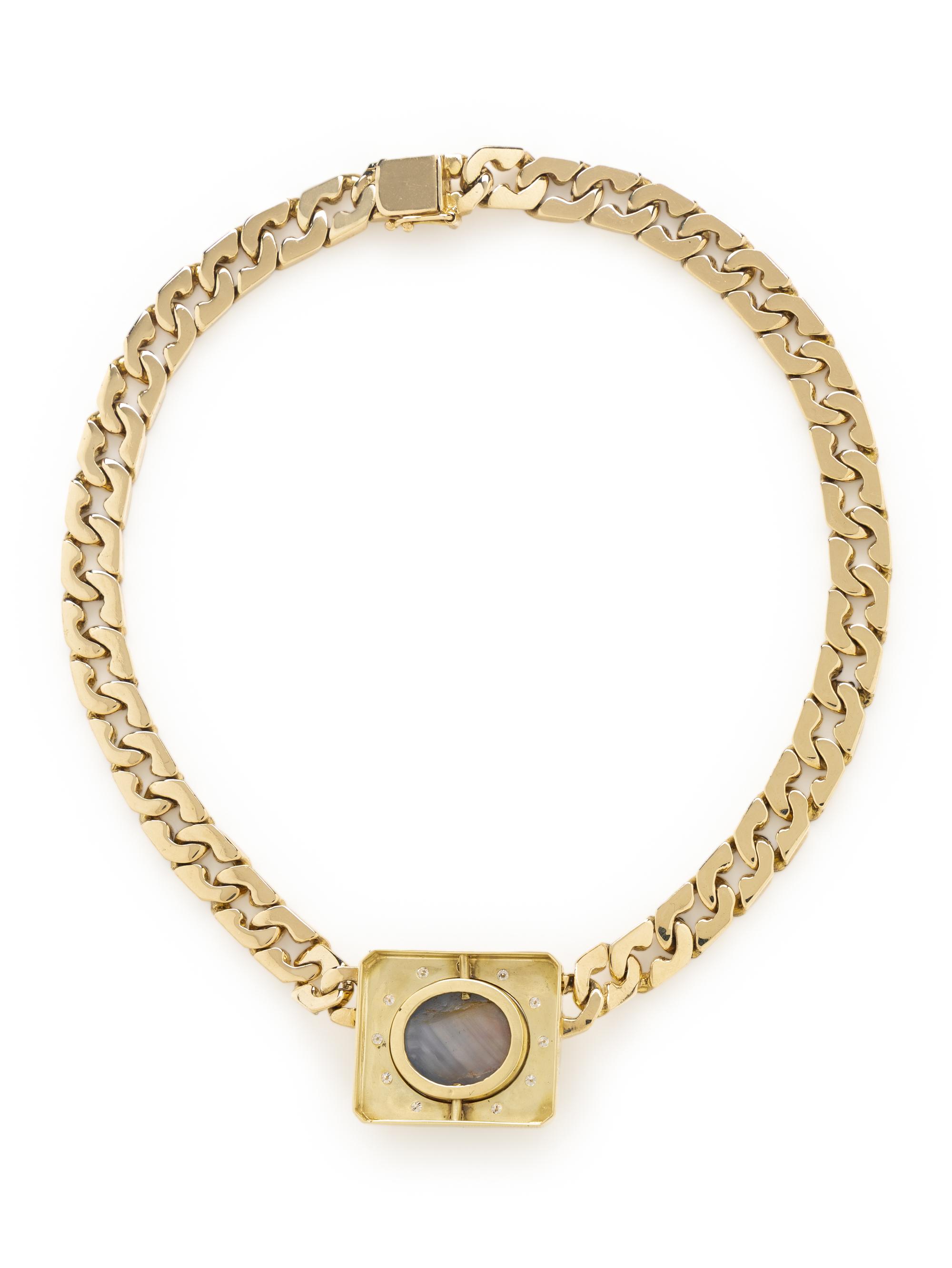 YELLOW GOLD, STAR SAPPHIRE, AND DIAMOND NECKLACE