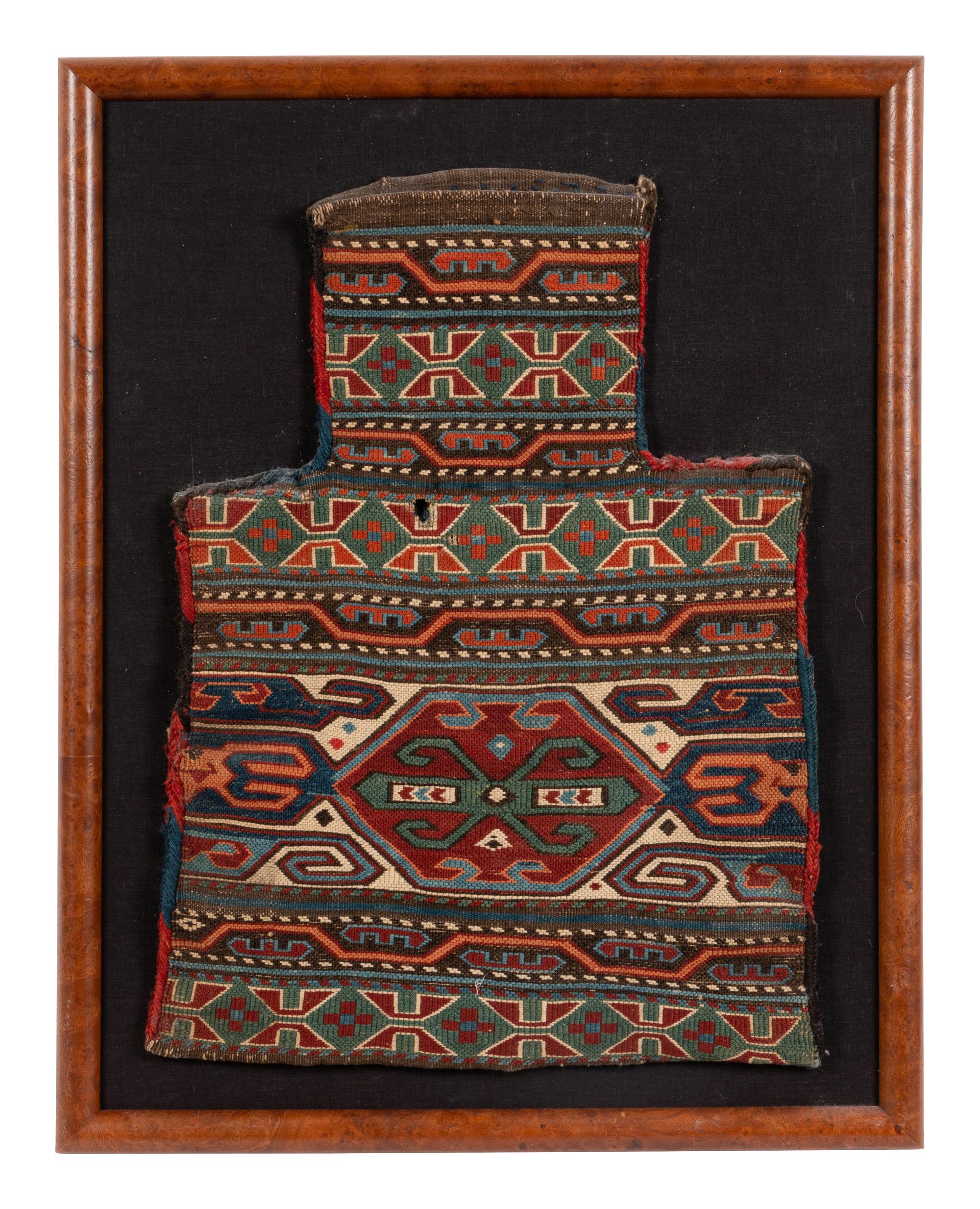 A Group of Six Framed Bag Faces