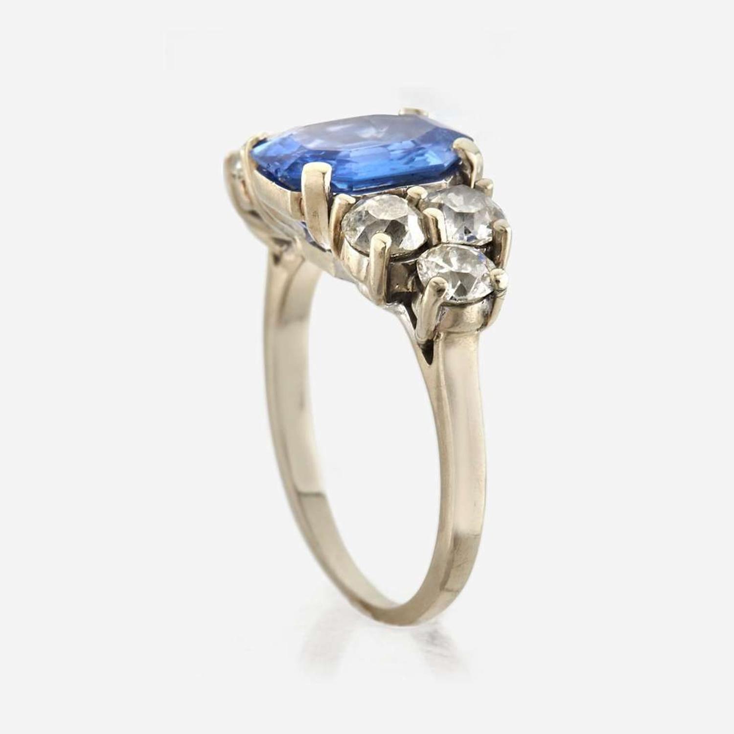 A sapphire, diamond, and white gold ring