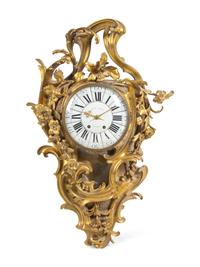 A Louis XV Style Gilt Bronze Cartel Clock by Henry Dasson