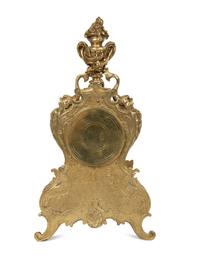A Louis XV Style Gilt Metal Clock Garniture — LATE 19TH/EARLY 20TH CENTURY